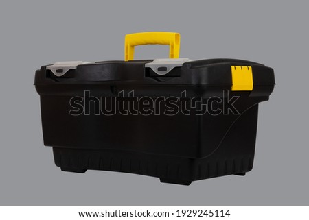 black plastic container tool box isolated on Ultimate Gray  background closeup