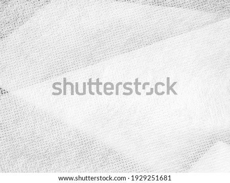 abstract white texture blur background of synthetic fabric fiber with detail and cross line a high resolution closeup of cloth surface or art and design