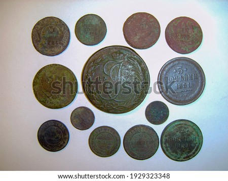 copper coins of tsarist russia of the 18-20th centuries on a light background