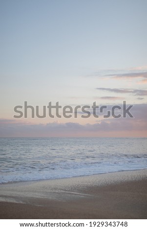 Soft colored sunrise on the beach