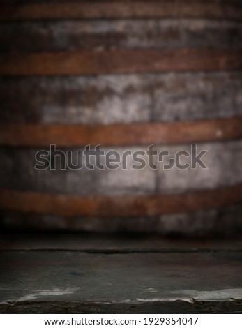 The background is barrel-shaped, free, empty. Old wood texture.