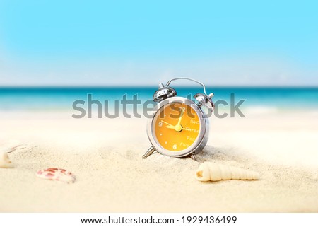 last minute to count down for travel or travel vacation concept. metaphor by old retro clock on sand beach. Royalty-Free Stock Photo #1929436499