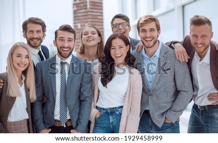 team of successful young people standing together. Royalty-Free Stock Photo #1929458999