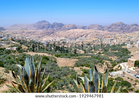 Wadi Musa village, houses and landscape around, the center of ancient Petra, Jordan  Royalty-Free Stock Photo #1929467981