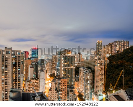 Wonderful night skyline of Hong Kong Island. Skyscrapers view from rooftop.
