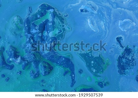 Abstract art blue colours water deep ocean flow acrylic splash texture closeup background wallpaper