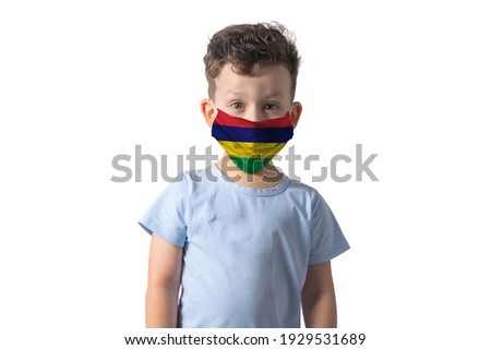 Respirator with flag of Mauritius. White boy puts on medical face mask isolated on white background.