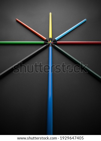 colored pencils, on black background, Shallow depth of field