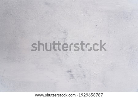 Textured background in the form of a gray wall