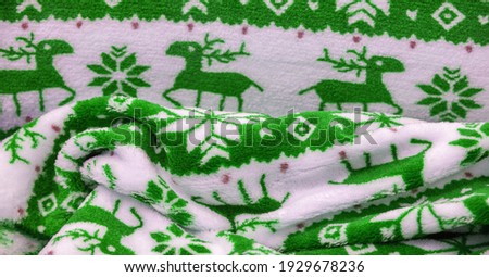 Velvet. Plush. For winter wear. Snow deer, snowflakes. Green and white tones. Silk fabric with soft, smooth and thick pile. Rich Silk Cloth
