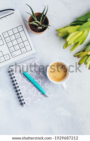 Cup of coffee, with communication device with and writing tools. Flat lay home business desk . Feminine business mockup, copyspace, white background.