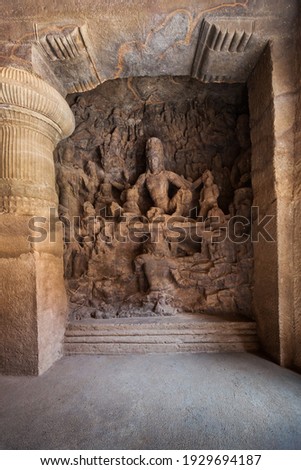Hindu carving at Elephanta Caves, a UNESCO World Heritage Site and cave temples on Elephanta Island near Mumbai city in India Royalty-Free Stock Photo #1929694187