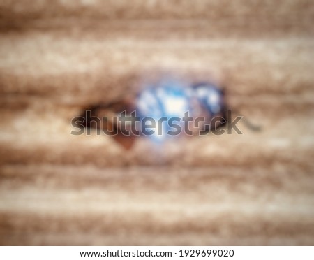 Defocused abstract background of perforated asbestos