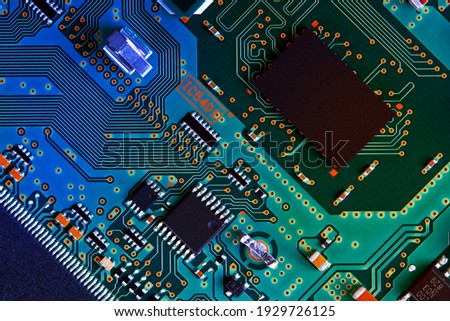 Electronic circuit board close up. Royalty-Free Stock Photo #1929726125