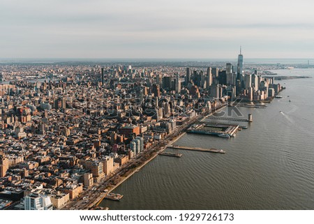 Aerial view of the Lower Manhattan in New York City as seen from a helicopter before the sunset