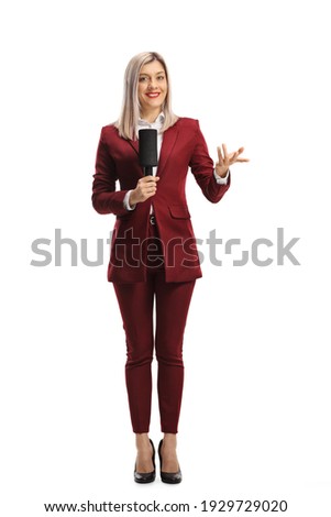 Full length portrait of a female reporter with a microphone gesturing with hand isolated on white background