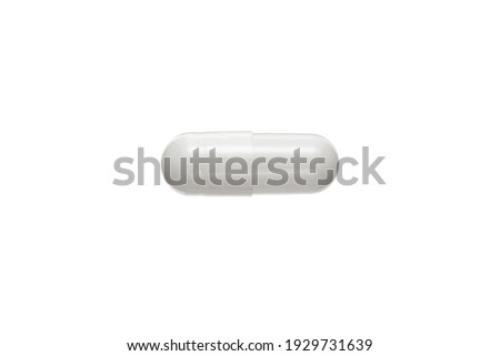 Tablet in capsule. Capsule pill on white background Royalty-Free Stock Photo #1929731639