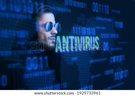 Beautiful stylish man on dark virtual reality background. Cryptocurrency, finance, future technology, innovative ideas concept. Futuristic holographic interface to display data.