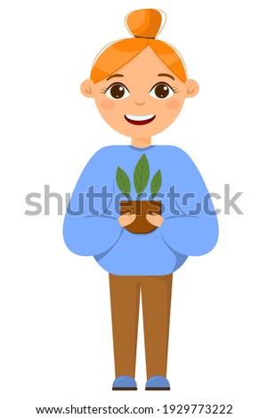 The girl is engaged in gardening. Girl isolated on white backgroundGardening beautiful red-haired girl with a bun, holding a pot of seedlings.