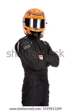 Racing driver posing with helmet isolated in white Royalty-Free Stock Photo #1929811289