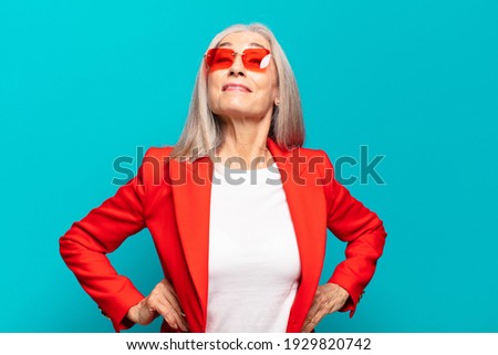 senior pretty businesswoman expressing a concept Royalty-Free Stock Photo #1929820742
