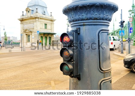 View of beautiful bicycle traffic light pole  on the road in Europe