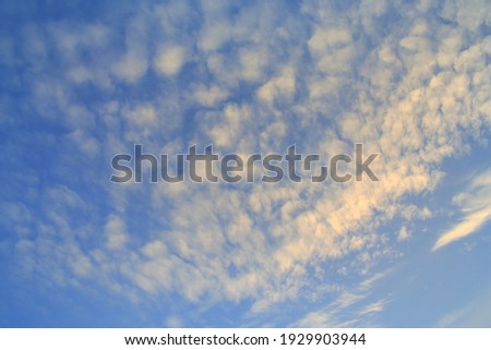 Background image of deep blue sky with  white clouds .