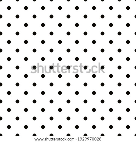 Seamless vector pattern black  polka dots on a white background.Abstract background. Decorative print.  Royalty-Free Stock Photo #1929970028