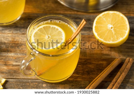 Homemade Hot Toddy Cocktail with Whiskey and Lemon Royalty-Free Stock Photo #1930025882
