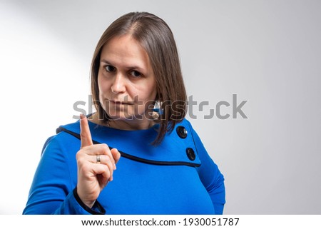 Woman gesturing a no sign. Closeup portrait woman raising finger up saying oh no you did not do that grey background. Negative emotions facial expressions, feelings