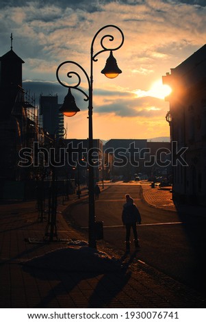 Street photography with a sunset scenery