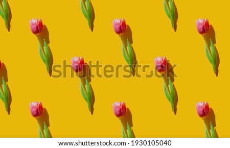 pink tulip on yellow background spring seamless pattern