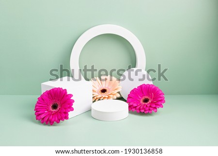 Podium, stand for product presentation and spring flowers. Mockup for branding and festive packaging presentation