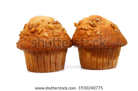 An espresso banana nut muffin isolated on pure white background