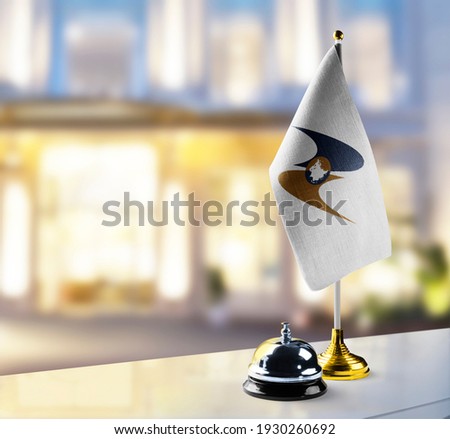 Eurasian Economic Union flag on the reception desk in the lobby of the hotel Royalty-Free Stock Photo #1930260692