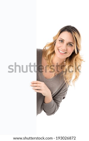 Portrait Of Happy Woman Holding Blank Billboard Looking At Camera Isolated On White Background