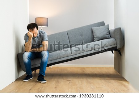 Lack Of Space Interior Design Mistake. Sofa Furniture Does Not Fit Royalty-Free Stock Photo #1930281110