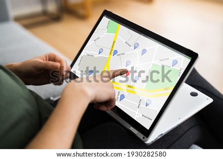 Online GPS Location Map Search On Laptop Computer Royalty-Free Stock Photo #1930282580