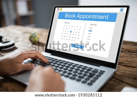 Booking Meeting Appointment On Laptop Computer Online Royalty-Free Stock Photo #1930285112