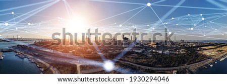 Modern factory and communication network concept. Telecommunication. IoT (Internet of Things). ICT (Information communication Technology). 5G. Smart factory. Digital transformation. Royalty-Free Stock Photo #1930294046