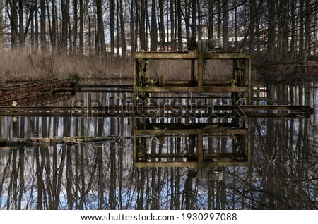 Remnants of the laboratory test setup in the 'Waterloopbos' forest in Marknesse in the Netherlands. Was used in the 1960s for the development of the Dutch Delta Works and foreign water works