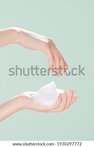 Display of foaming effect of hand cleaning body wash Essence Facial Cleanser bubble Royalty-Free Stock Photo #1930297772