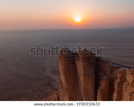 Edge of the World escarpment tourist area near Riyadh at sunset, Saudi Arabia