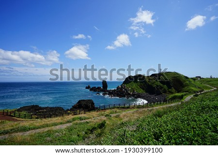 a charming seascape with a walkway, scenery around seopjikoji Royalty-Free Stock Photo #1930399100