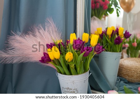 bouquet of tulips in a bucket