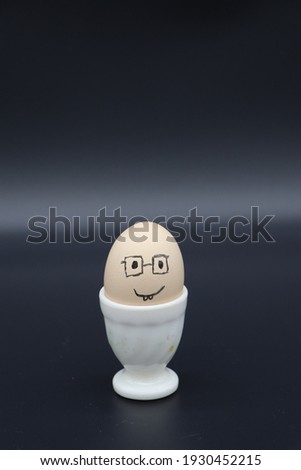 Egg on face emoji with black background