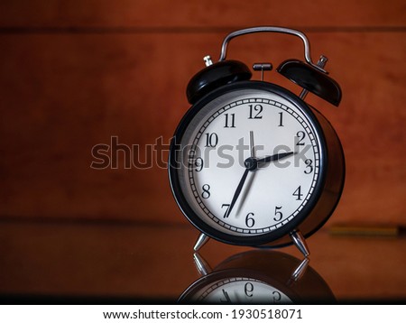 black vintage or retro alarm clock