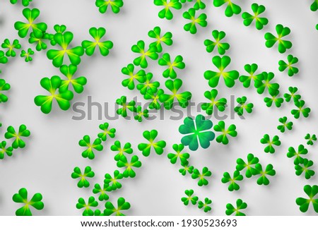 CLowers three-leaved shamrocks green on white background. St. Patrick's day holiday symbol. Pattern. Wallpaper.