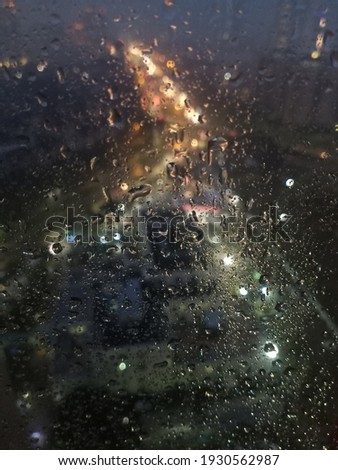 defocused background rain on the window