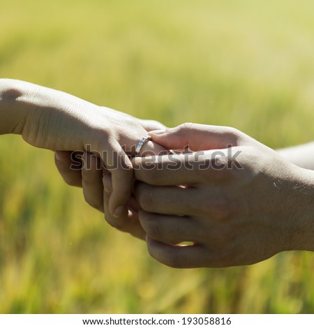 young hands when getting engaged
